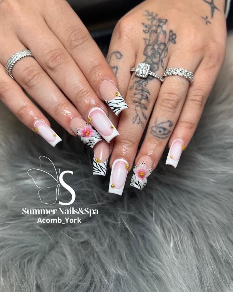 Square French tips with zebra print and floral accents